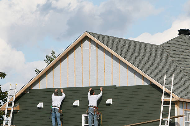 Professional Siding Repair technician working in Brighton, MA